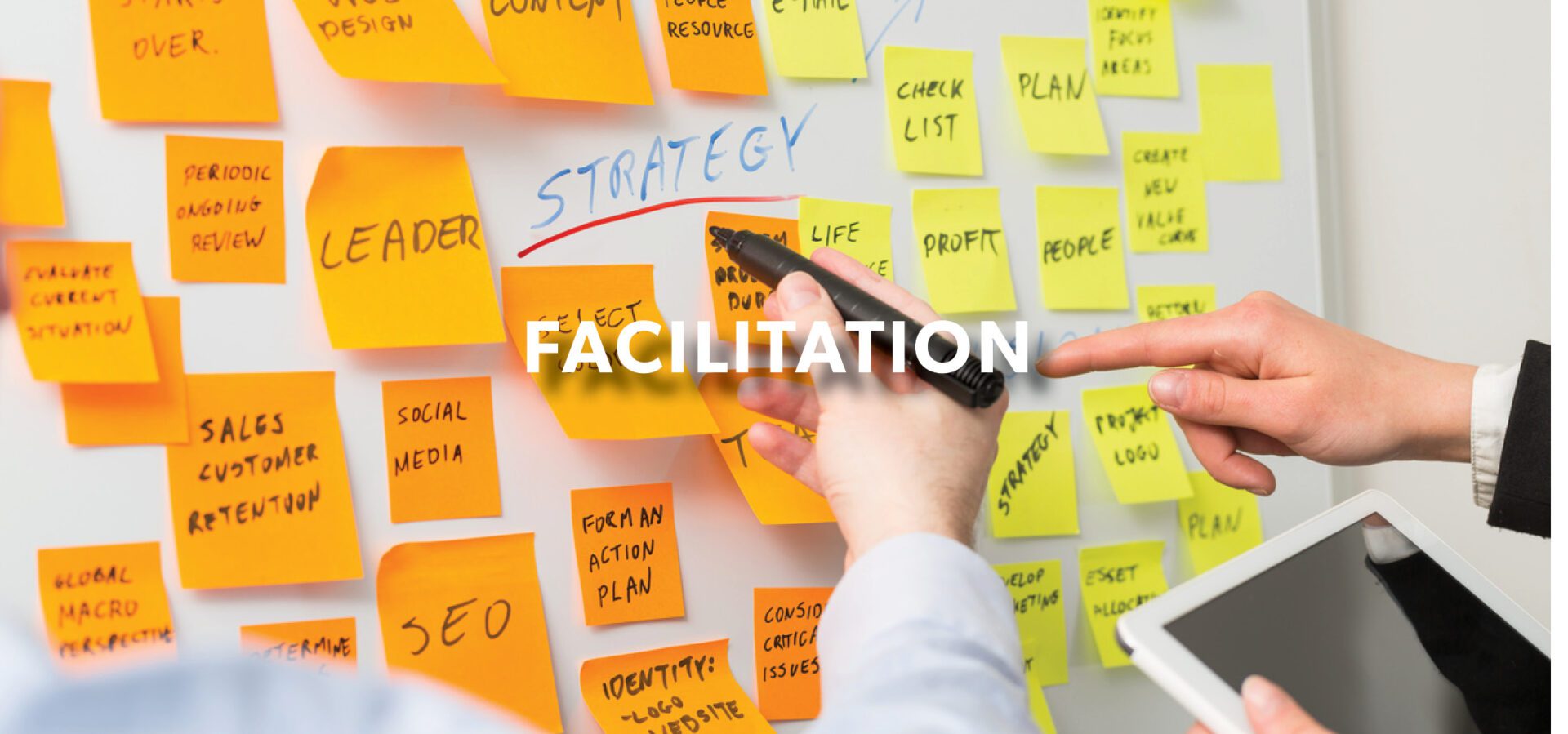 Facilitation Banner with sticky notes in the background